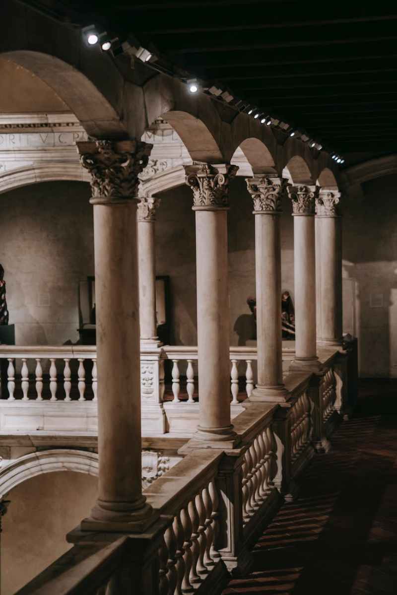interior of grand mansion hall with pillars